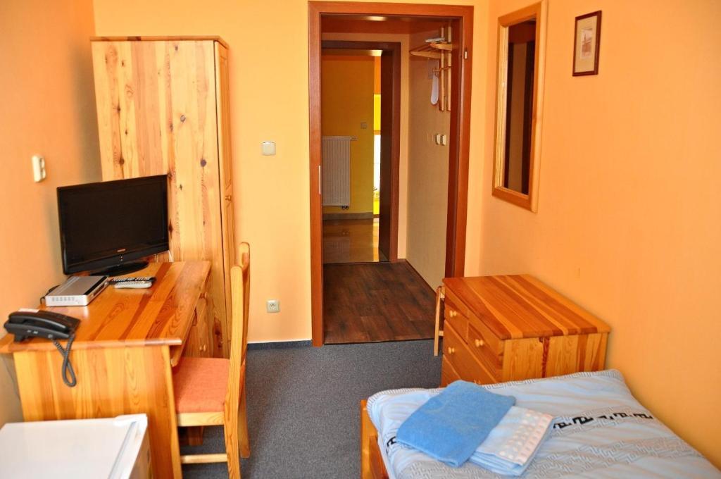 Hotel U Radnice Лоуни Номер фото